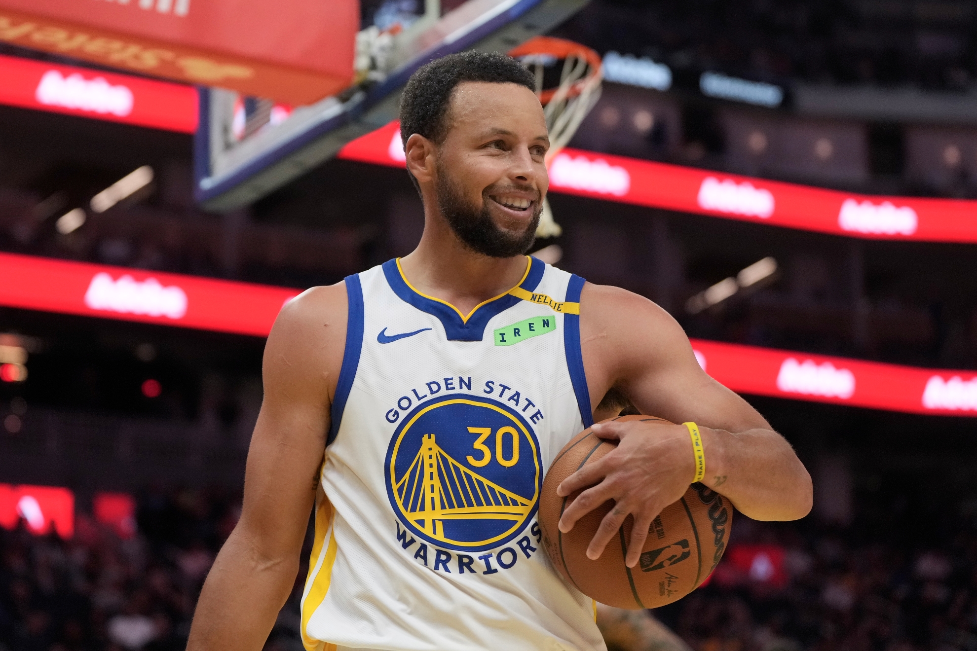 Golden State Warriors guard Stephen Curry (30) smiles during a preseason NBA game against the Portland Trail Blazers.