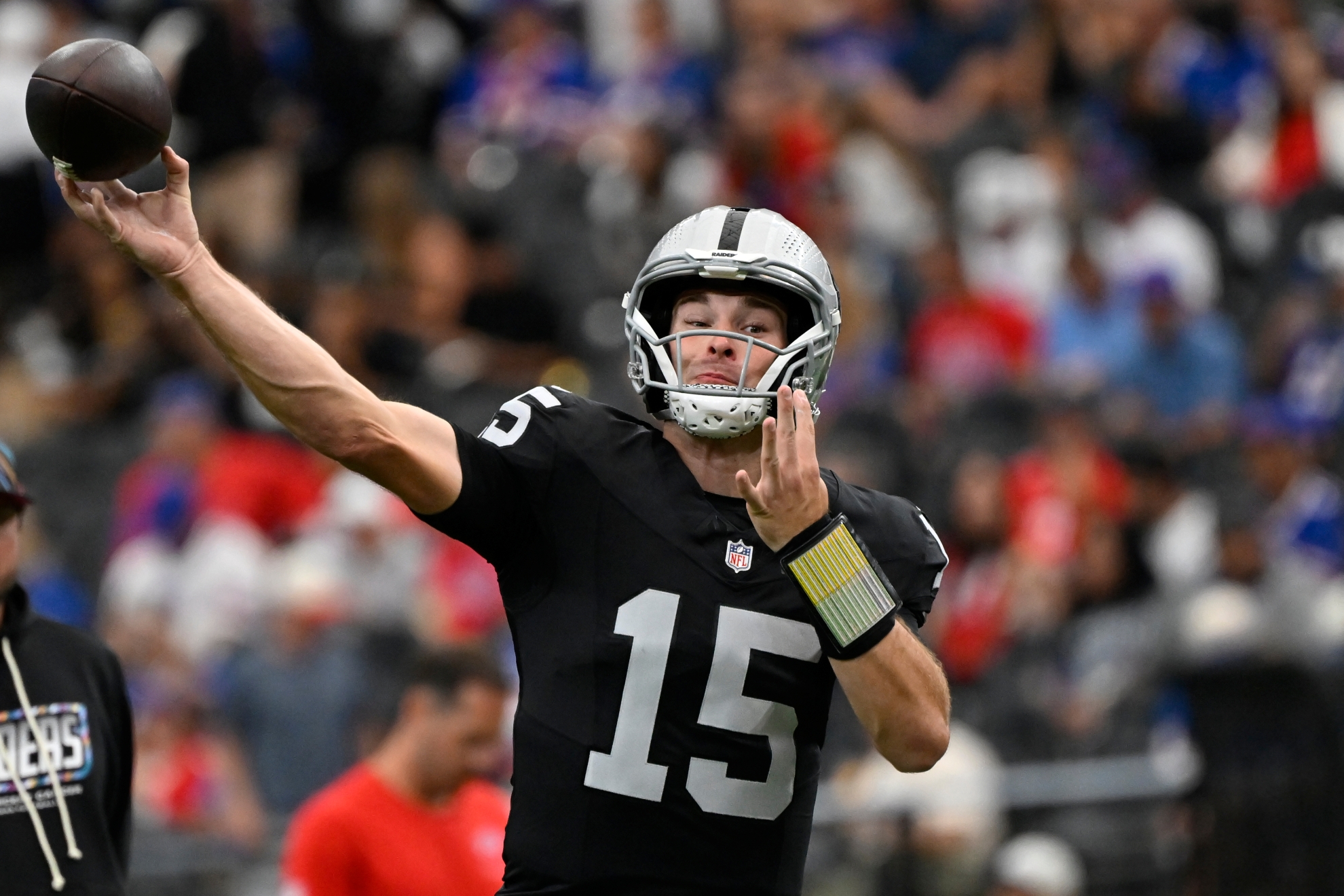 Las Vegas Raiders quarterback Fernando Mendoza (15) throws before an NFL football game against the Buffalo Bills in Las Vegas