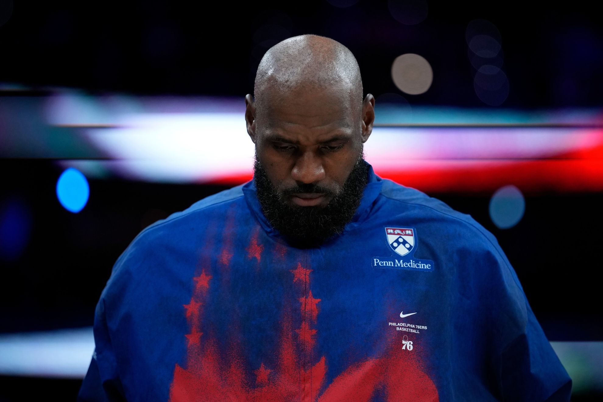 Philadelphia 76ers' LeBron James stands before a preseason NBA basketball game between the Philadelphia 76ers