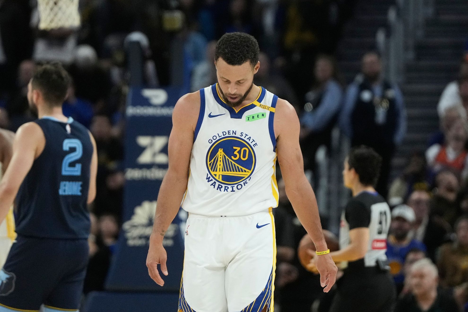 Golden State Warriors guard Stephen Curry walks on the floor