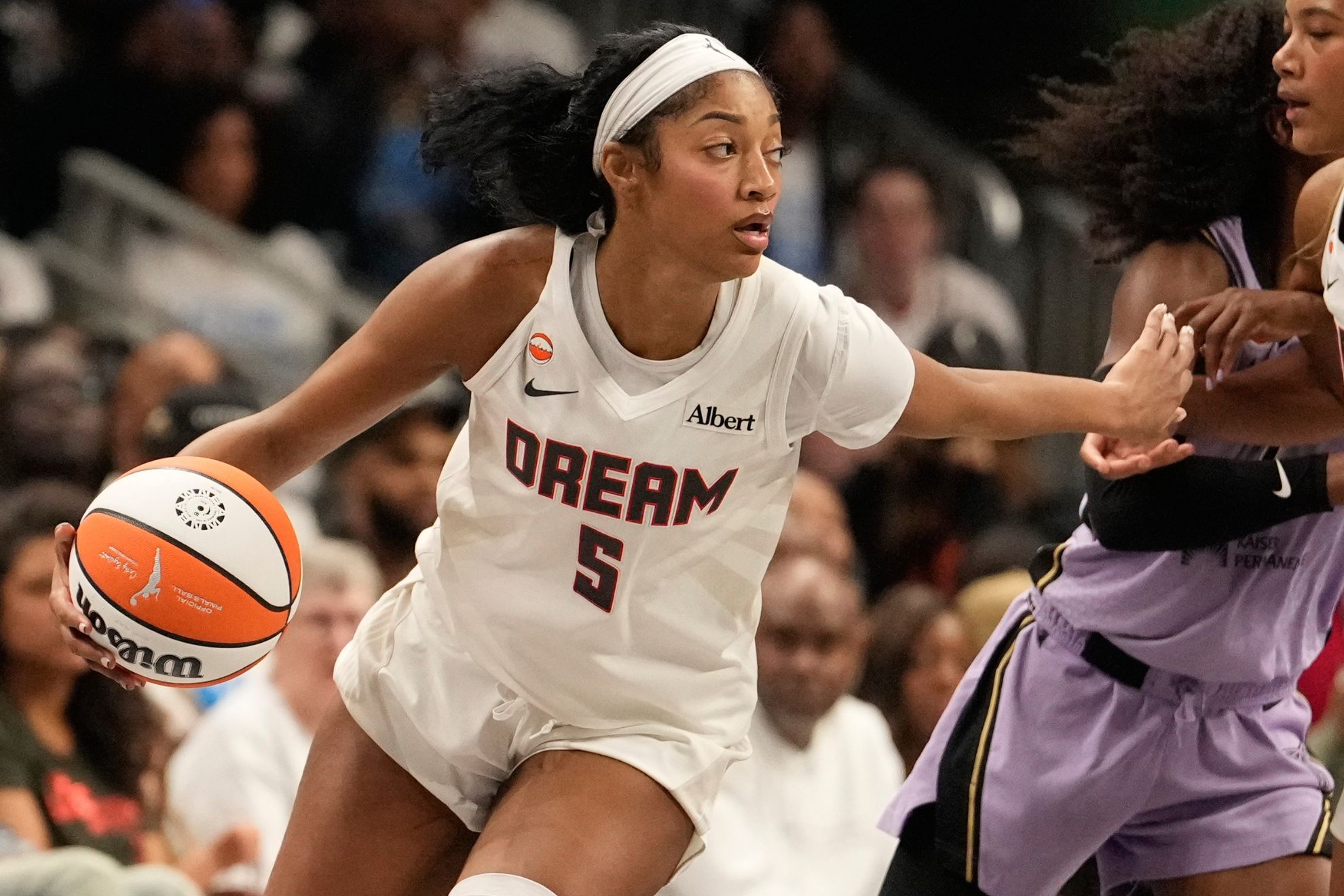 Atlanta Dream forward Angel Reese (5) dribbles the ball during Game 4 of the WNBA basketball finals against the Golden State Valkyries on Saturday, Oct. 24, 2026, in Atlanta. (AP Photo/Brynn Anderson)