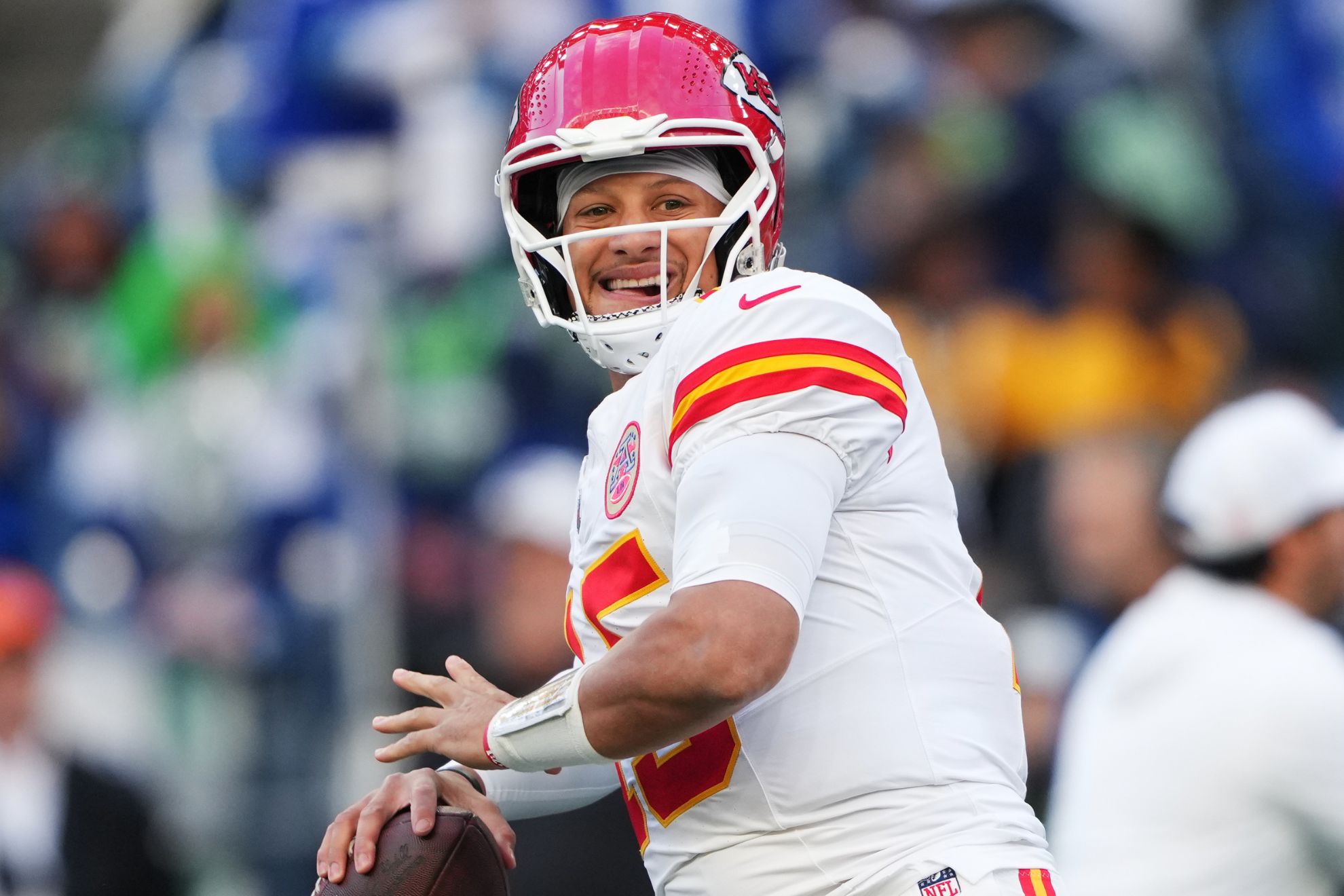 Kansas City Chiefs quarterback Patrick Mahomes warms up before an NFL football game against the Seattle Seahawks