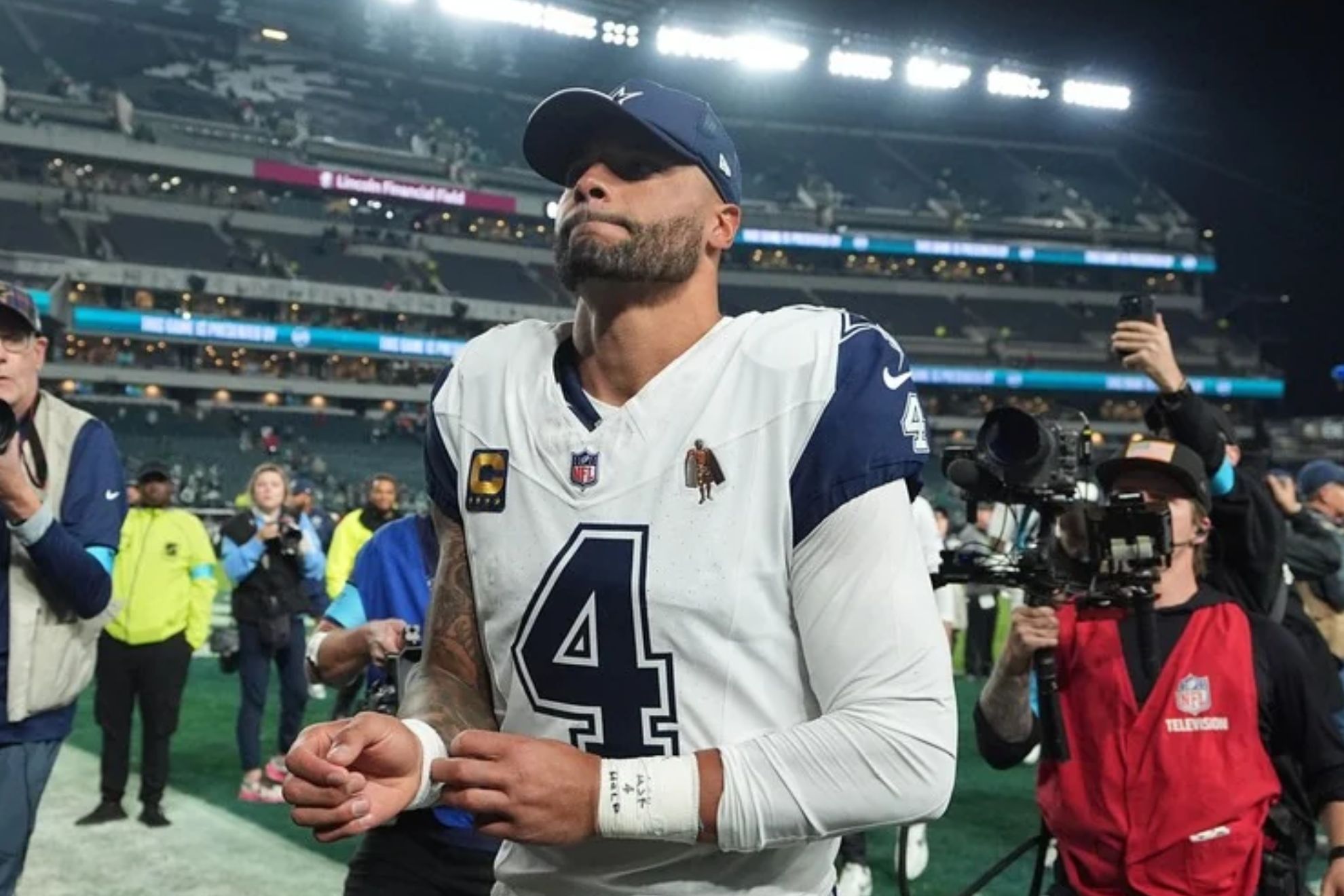 Dallas Cowboys quarterback Dak Prescott (4) leaves the field