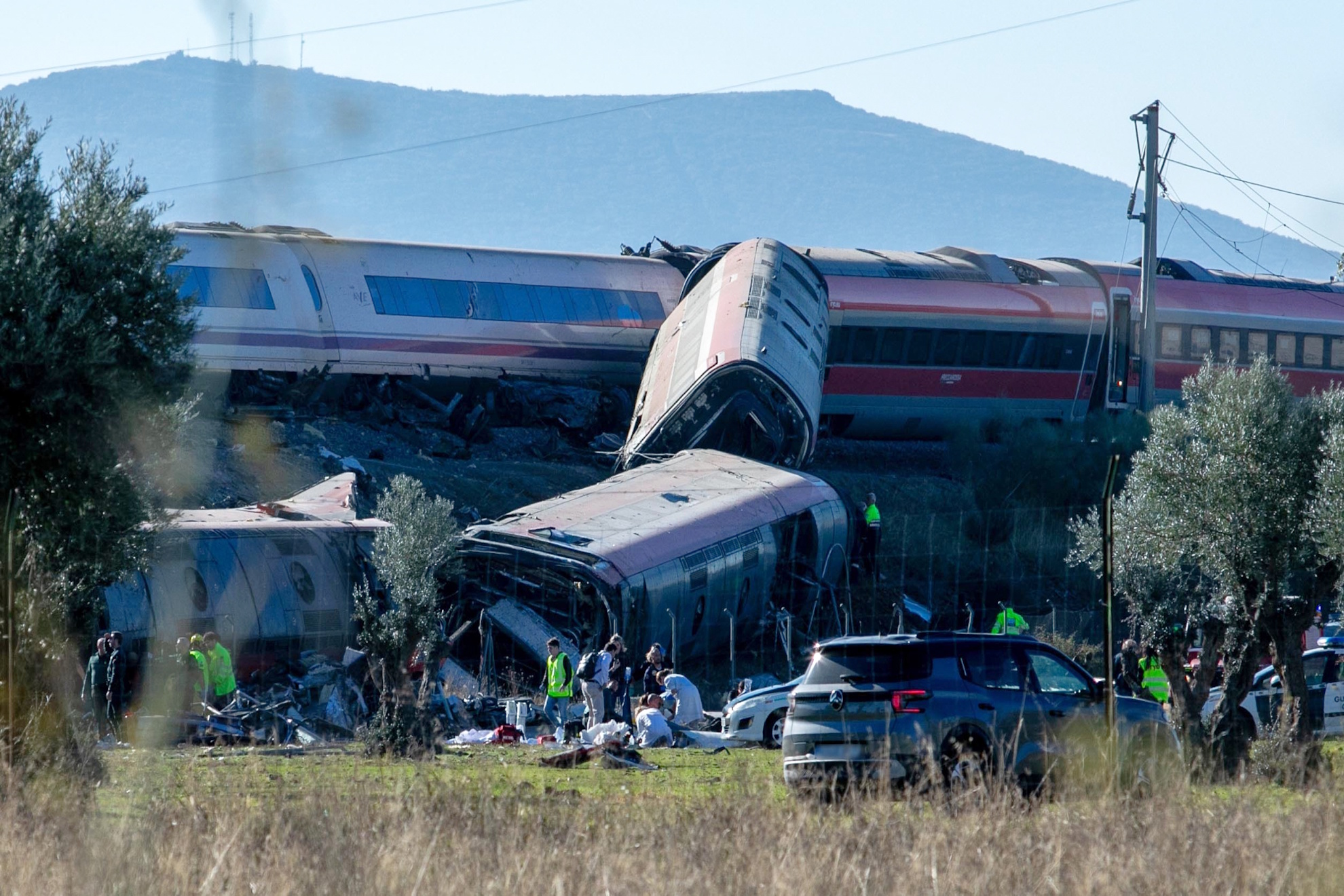 Emergency services attend to the victims at the scene of a collision between two trains in Urda, Spain, on Wednesday, Oct. 28. Juanma JimÈnez; Juanma Jiménez