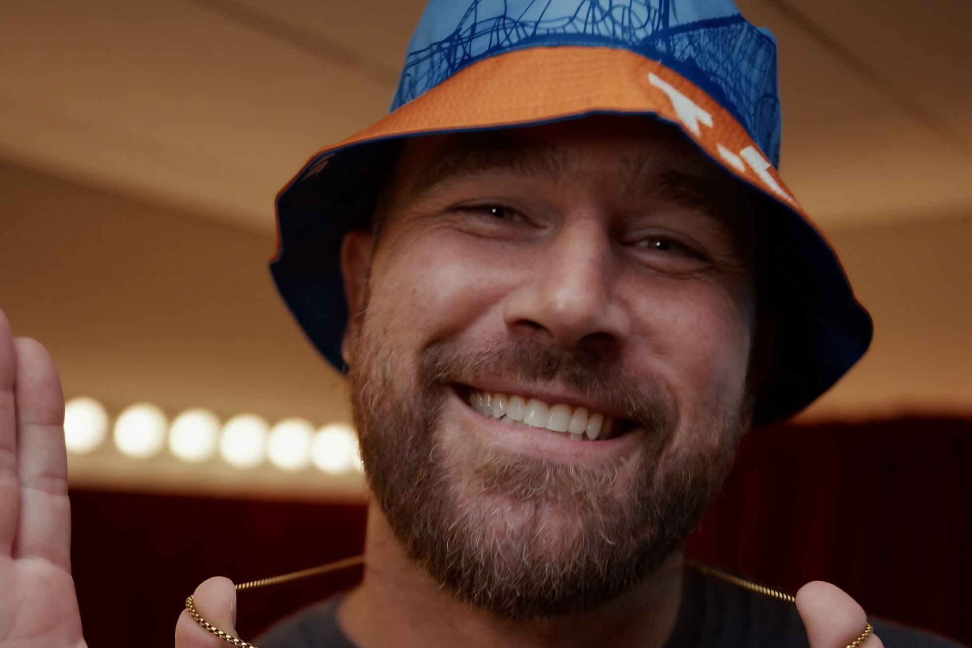 Travis Kelce smiles for a photo